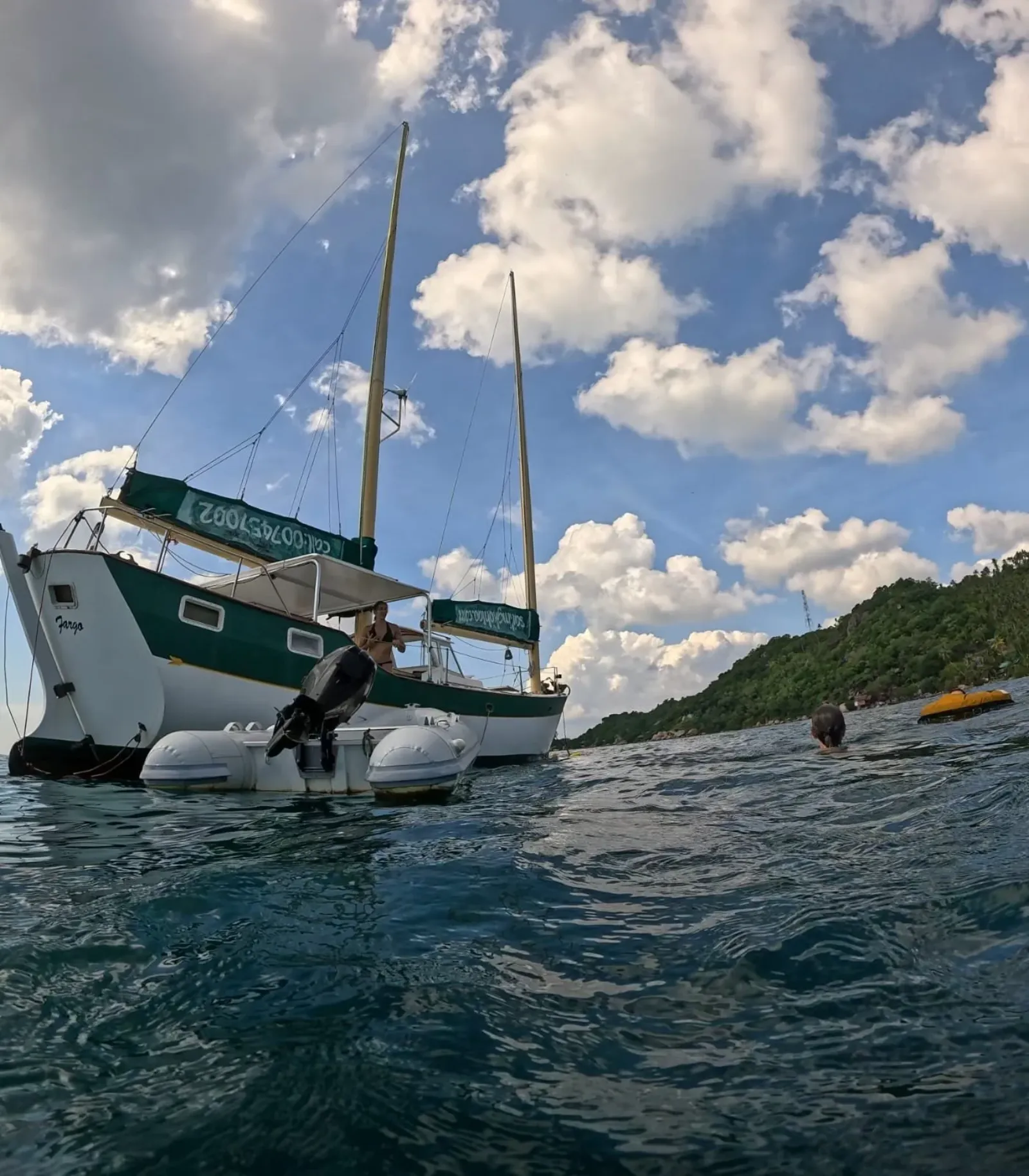 The deck of SV Freedom Fargo at anchor in calm water off Koh Tao